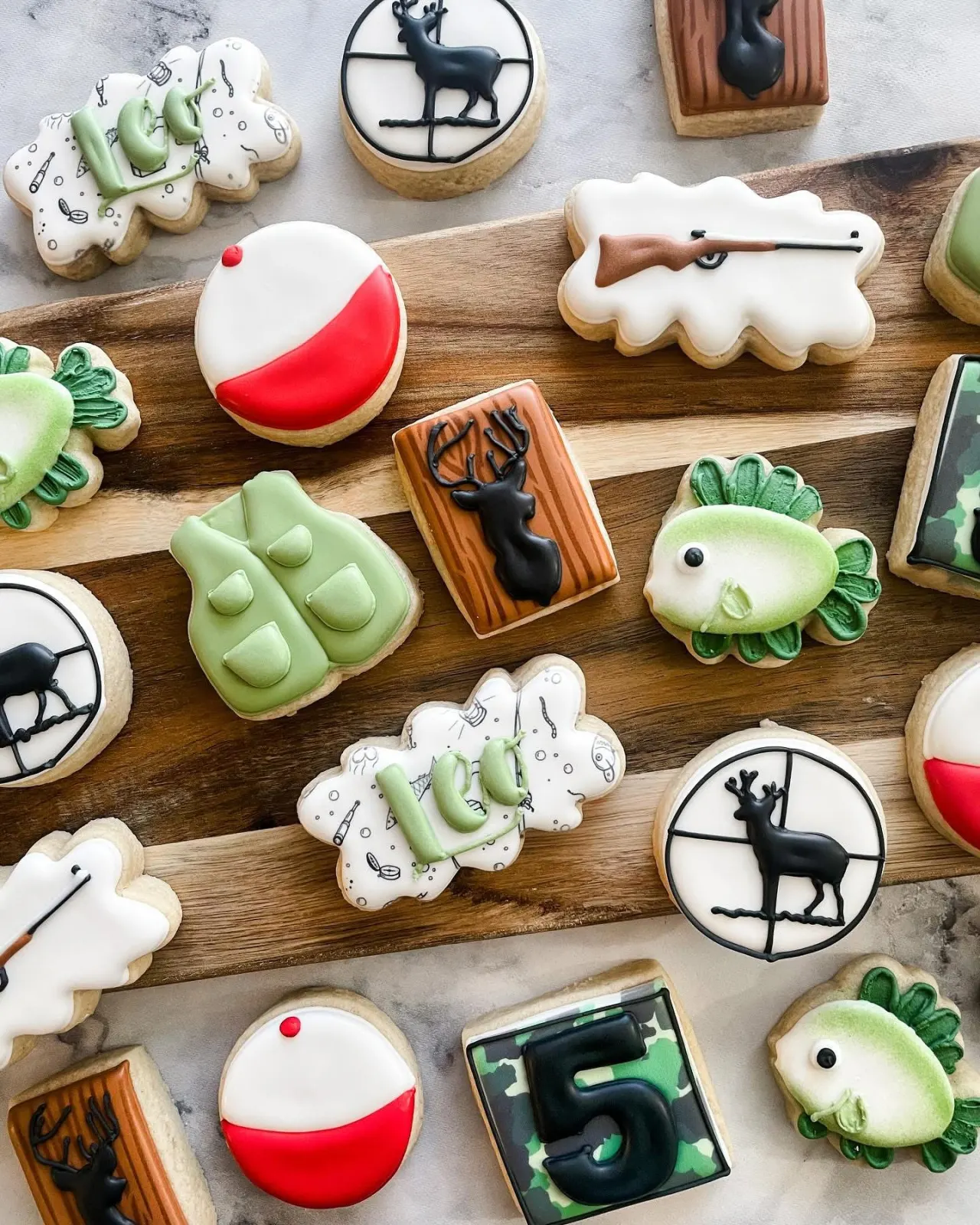 Fishing themed mini cookies with deer and bobber details
